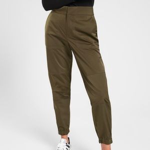 Athlete radiant jogger in olive